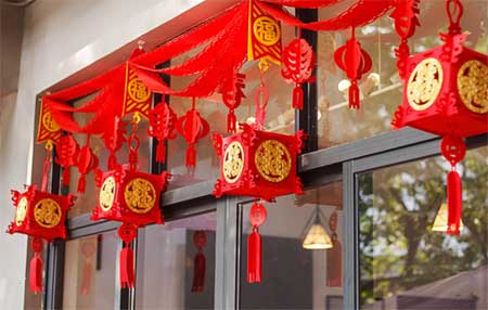 Red couplets are put up for Chinese New Year.