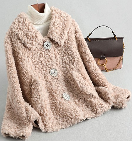 Women's winter warm fur coat made of natural wool