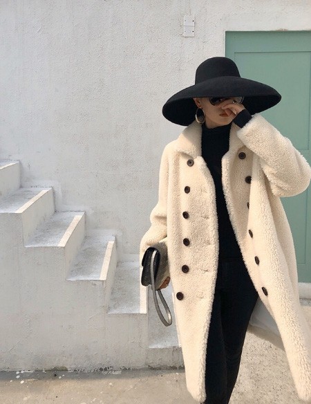 Women's winter coat made of sheep, natural fur